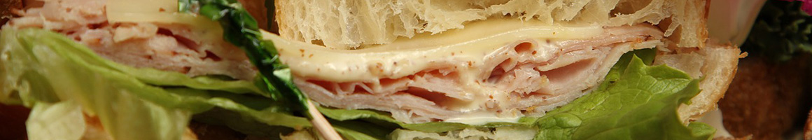 Eating Sandwich at Little King Sandwich Shop restaurant in Hamilton Square, NJ.